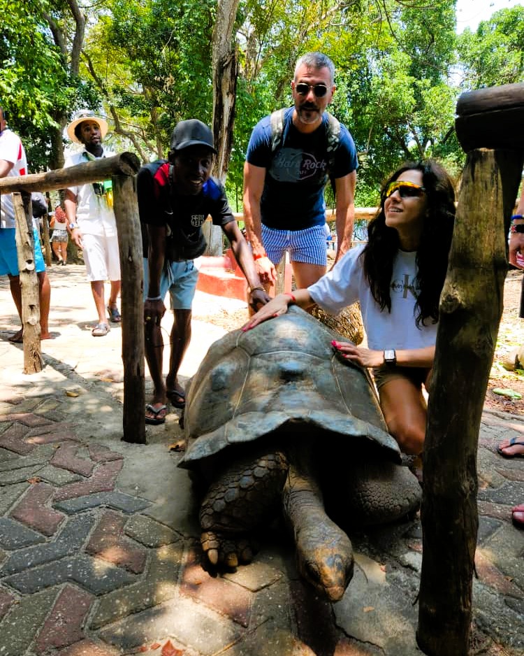 Team member of Pasqualino Zanzibar Tours and Safari assisting a client