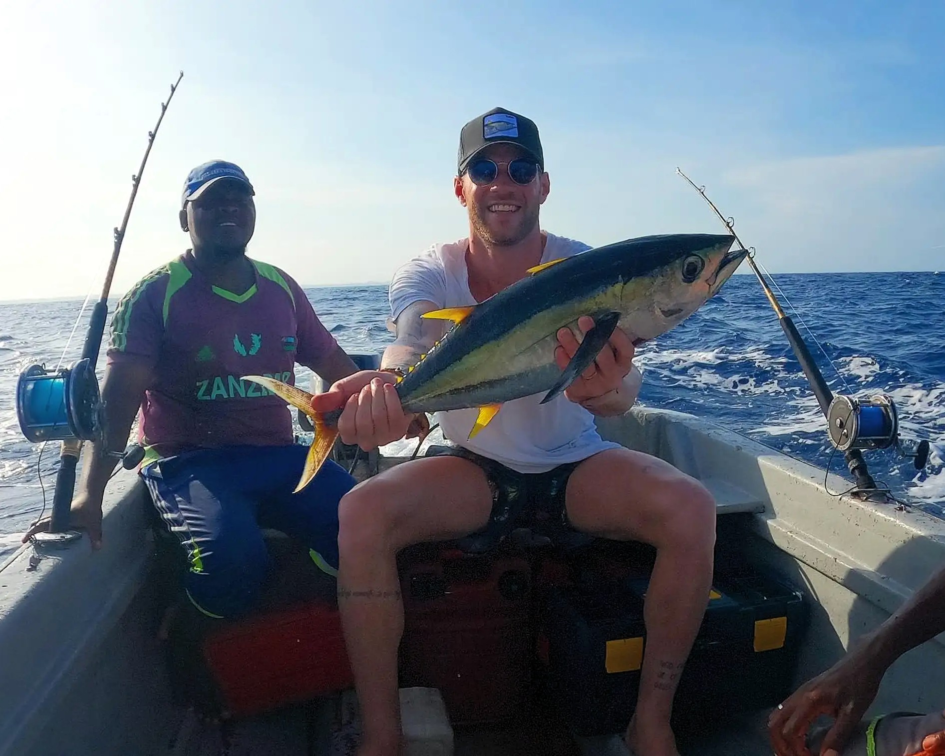 Fresh catch of tuna and marlin displayed on the deck of a Zanzibar fishing boat