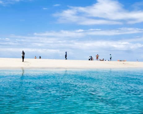 Snorkeling in vibrant coral reefs at Nakupenda Sandbank