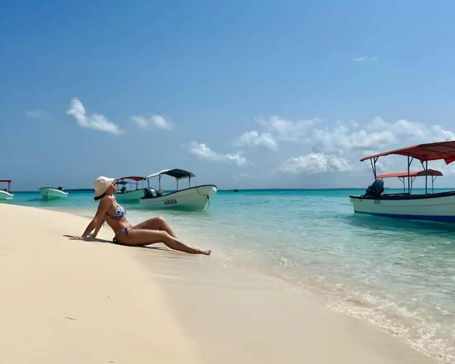 Colorful marine life in the turquoise waters of Pungume Sandbank