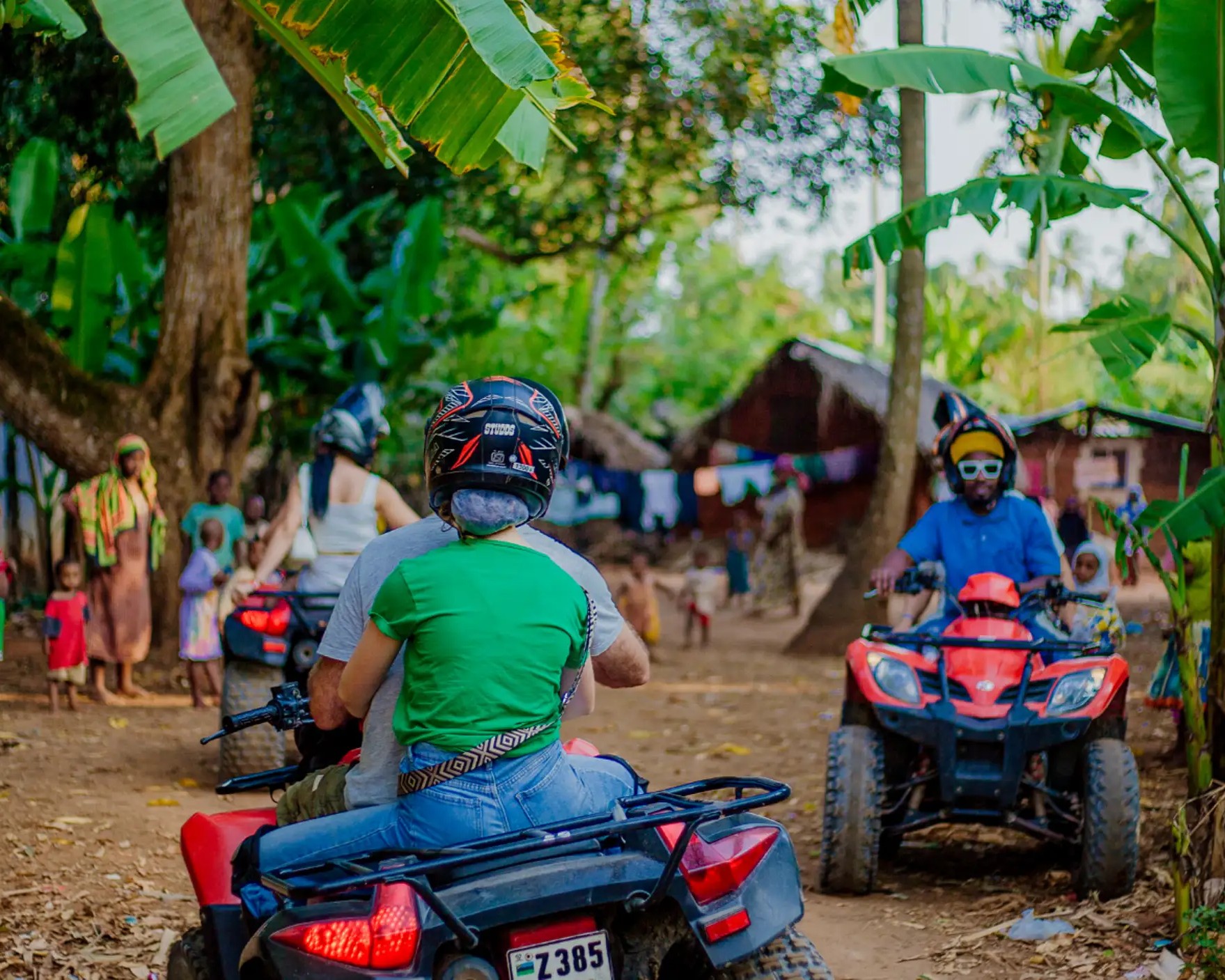 Adventurer on quad bike navigating coastal trails in Zanzibar