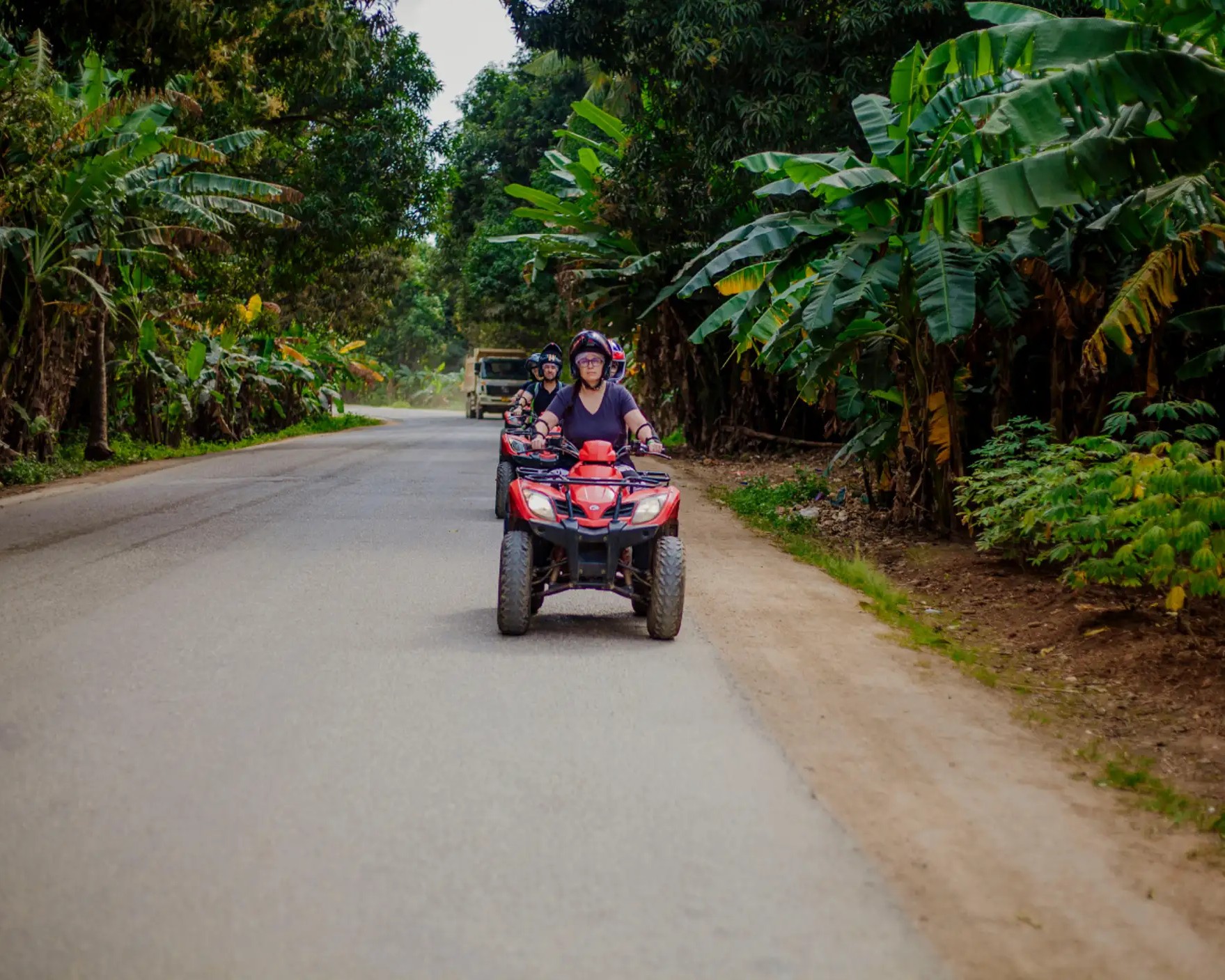 Quad biking through lush forests and greenery in Zanzibar